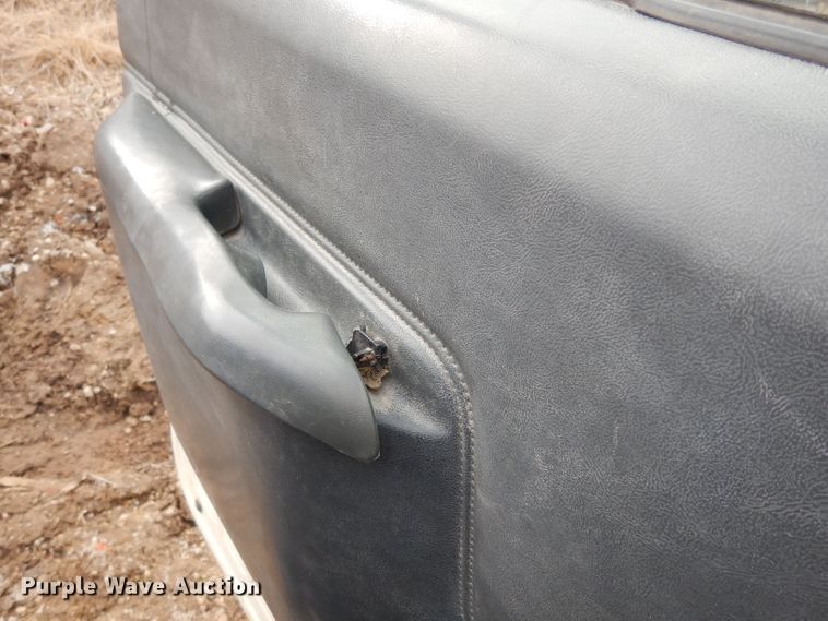 image for item DG6335 1991 Ford F350 flatbed truck with sprayer