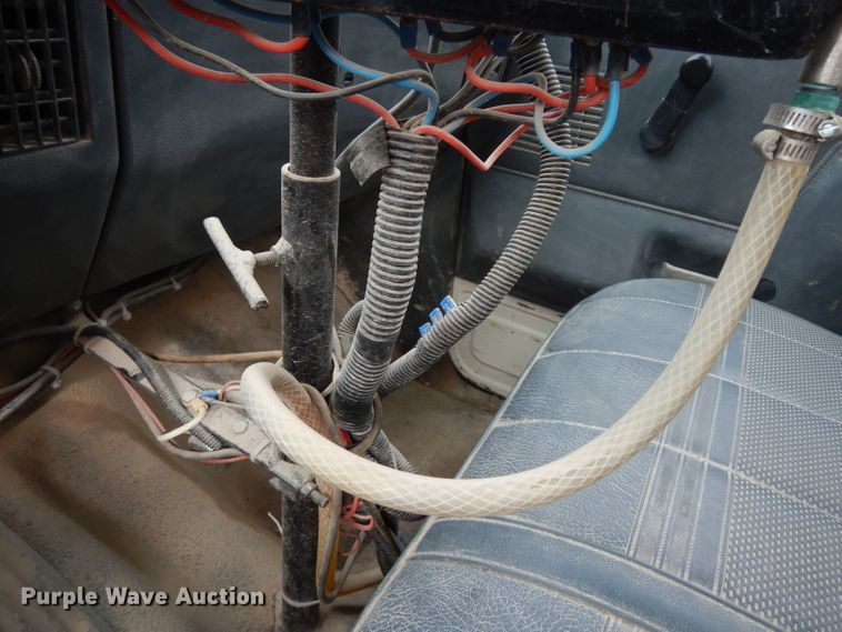 image for item DG6335 1991 Ford F350 flatbed truck with sprayer