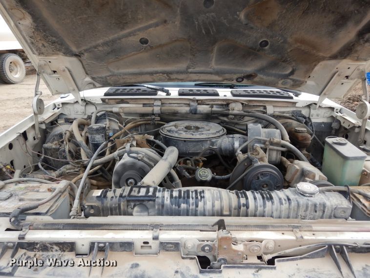 image for item DG6335 1991 Ford F350 flatbed truck with sprayer