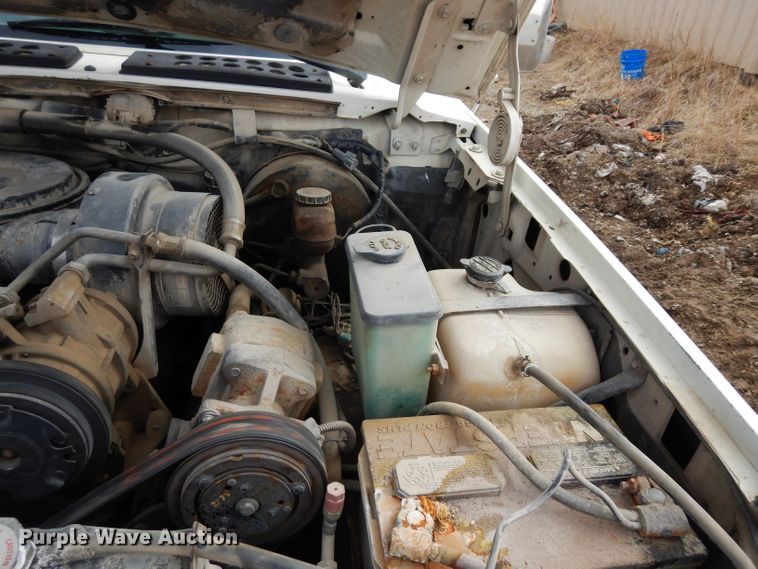 image for item DG6335 1991 Ford F350 flatbed truck with sprayer