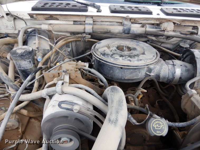 image for item DG6335 1991 Ford F350 flatbed truck with sprayer