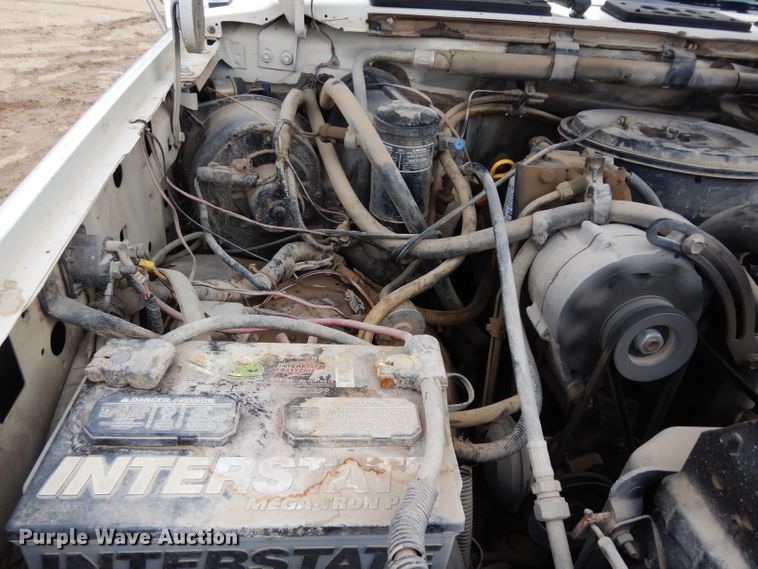 image for item DG6335 1991 Ford F350 flatbed truck with sprayer