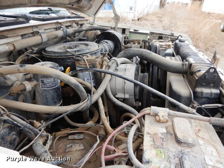 image for item DG6335 1991 Ford F350 flatbed truck with sprayer