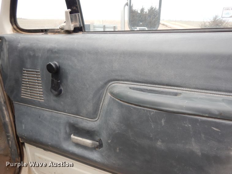 image for item DG6335 1991 Ford F350 flatbed truck with sprayer