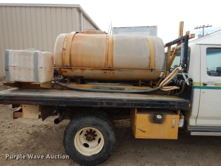 image for item DG6335 1991 Ford F350 flatbed truck with sprayer