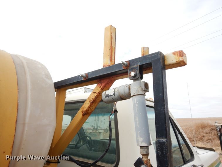 image for item DG6335 1991 Ford F350 flatbed truck with sprayer