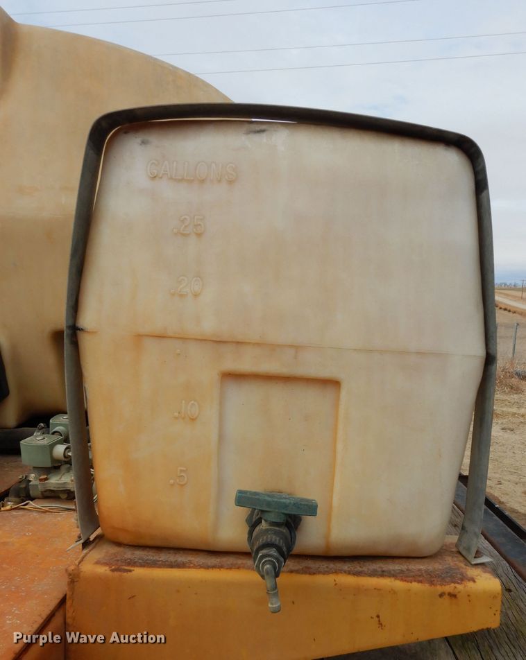 image for item DG6335 1991 Ford F350 flatbed truck with sprayer