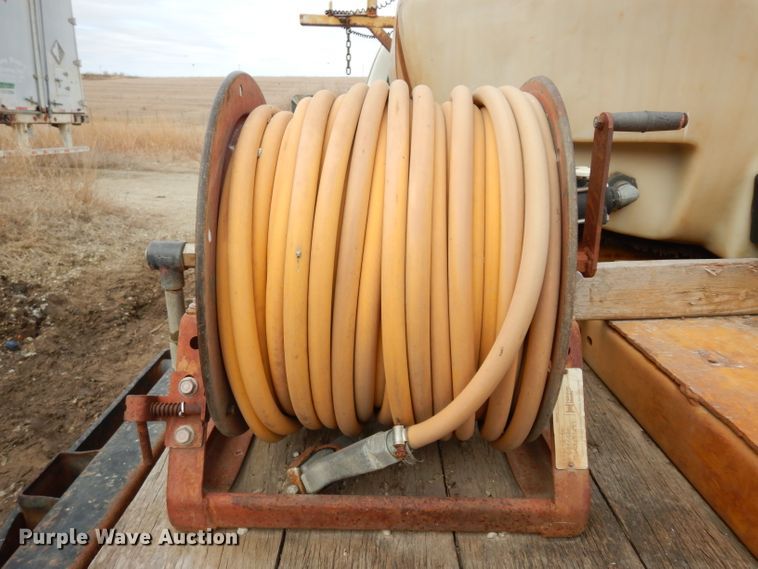 image for item DG6335 1991 Ford F350 flatbed truck with sprayer