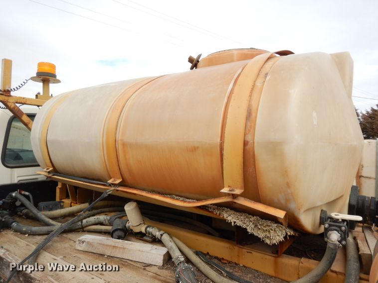 image for item DG6335 1991 Ford F350 flatbed truck with sprayer