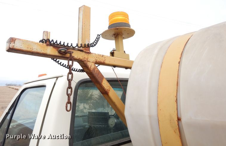 image for item DG6335 1991 Ford F350 flatbed truck with sprayer