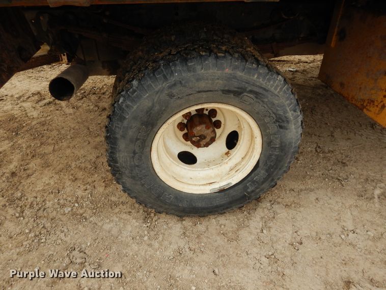 image for item DG6335 1991 Ford F350 flatbed truck with sprayer