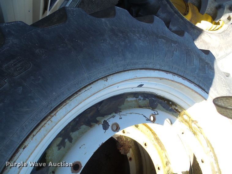 image for item DD1770 (4) Firestone 380/90R46 tires and wheels