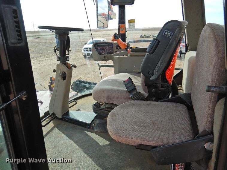 image for item DI0046 2012 MacDon M205 windrower