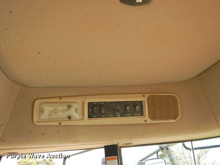 image for item DI0046 2012 MacDon M205 windrower