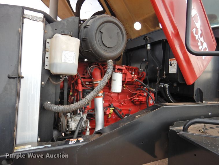 image for item DI0047 2012 MacDon M205 windrower