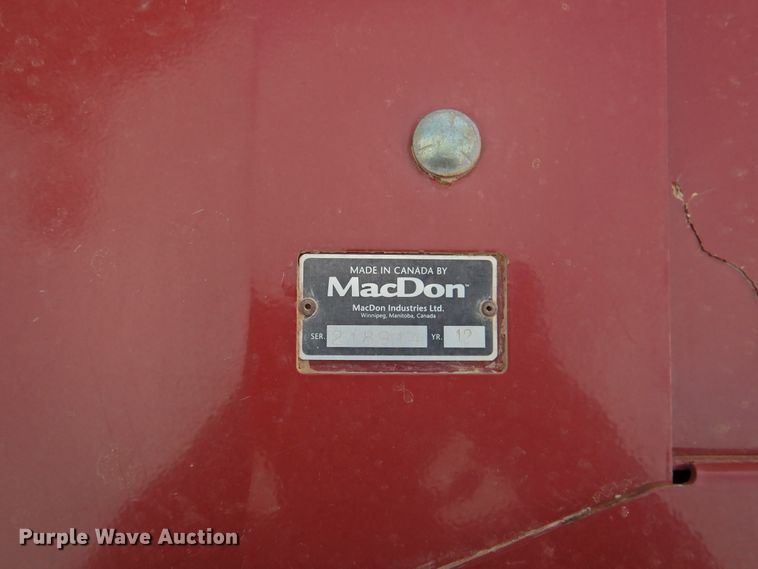 image for item DI0047 2012 MacDon M205 windrower