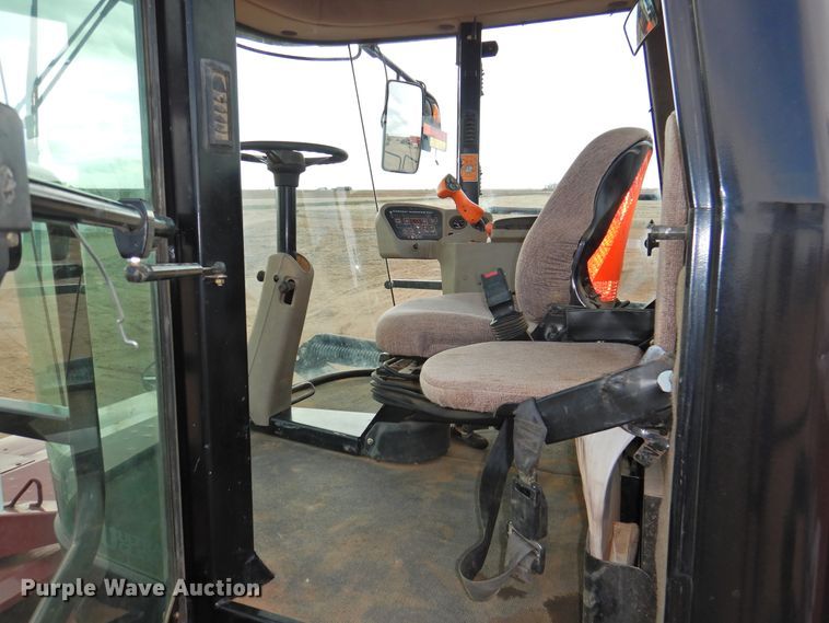 image for item DI0047 2012 MacDon M205 windrower