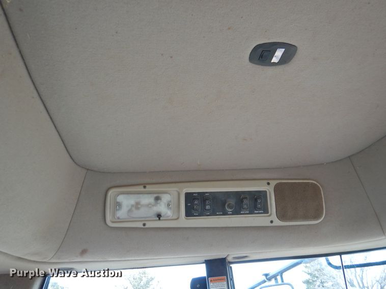 image for item DI0047 2012 MacDon M205 windrower