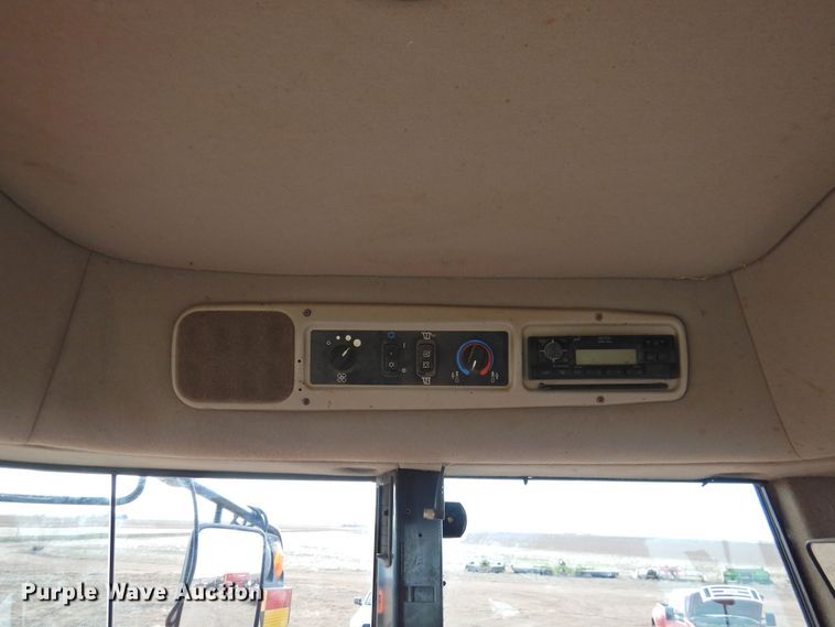 image for item DI0047 2012 MacDon M205 windrower