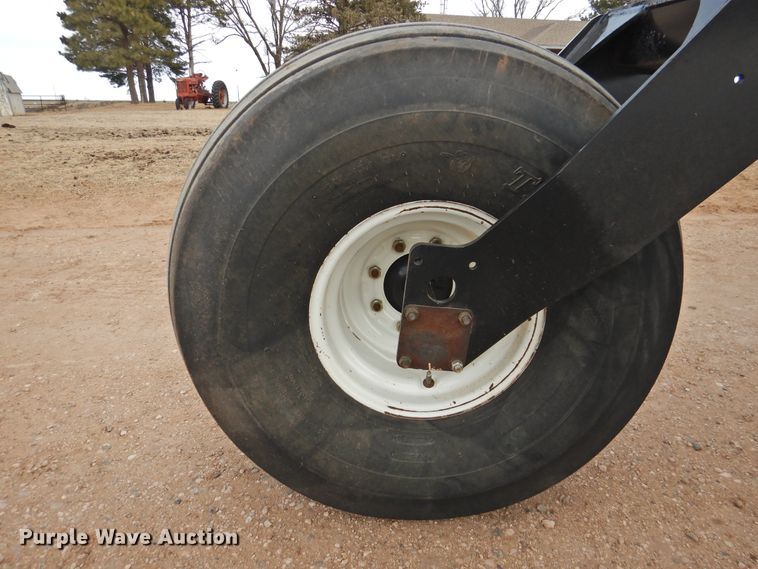 image for item DI0047 2012 MacDon M205 windrower