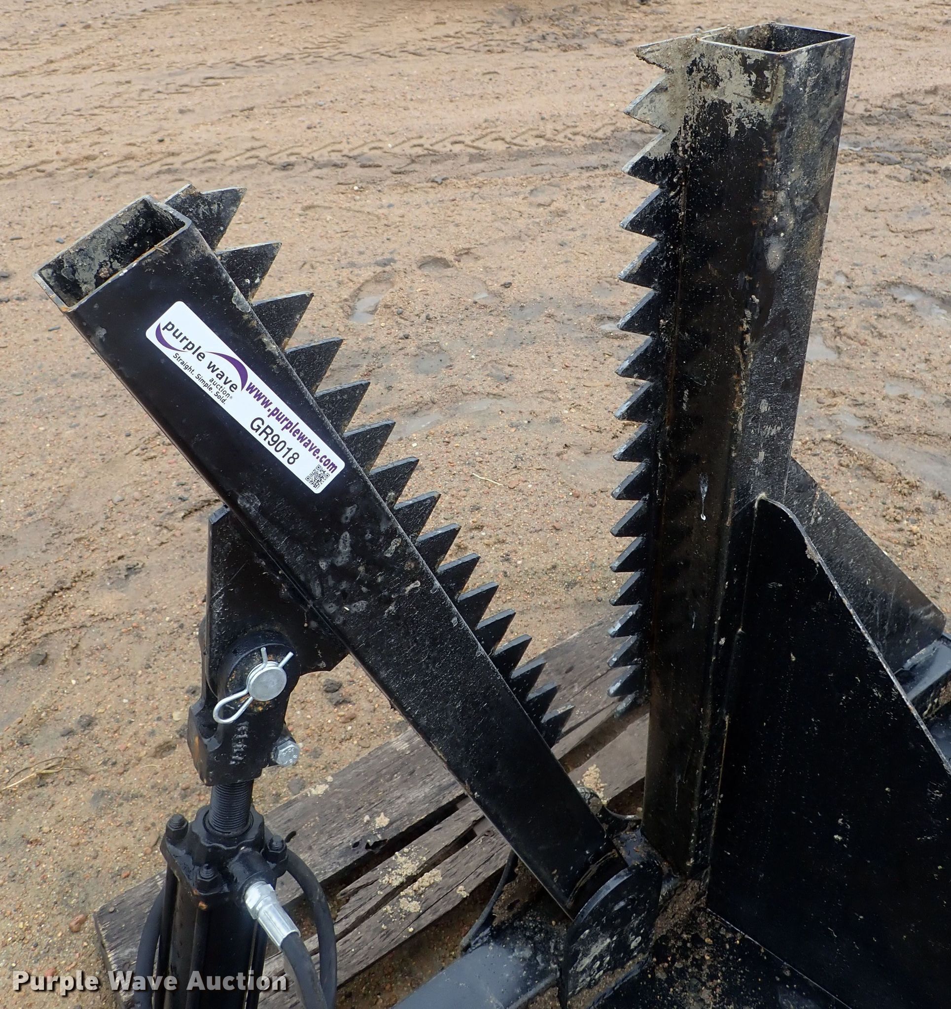 Skid steer tree cutter in Kinsley, KS Item GR9018 sold Purple Wave