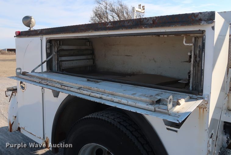 image for item DH0855 1999 GMC C7500 service truck