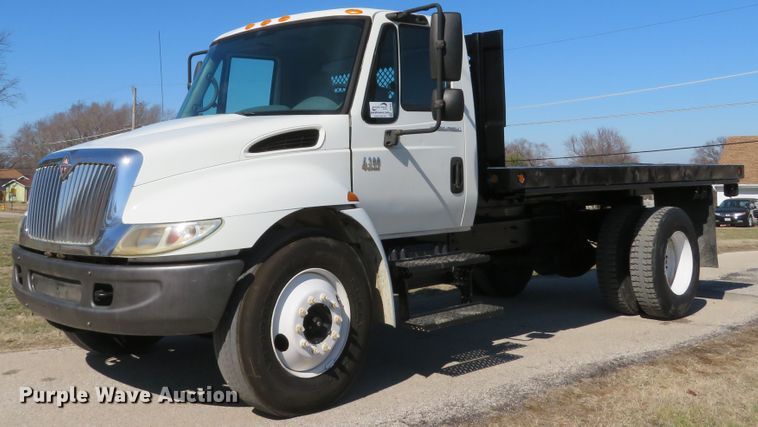 image for item DI2080 2002 International 4300 dump flatbed truck