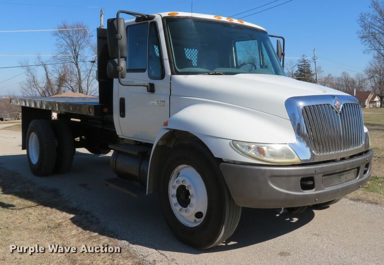 image for item DI2080 2002 International 4300 dump flatbed truck