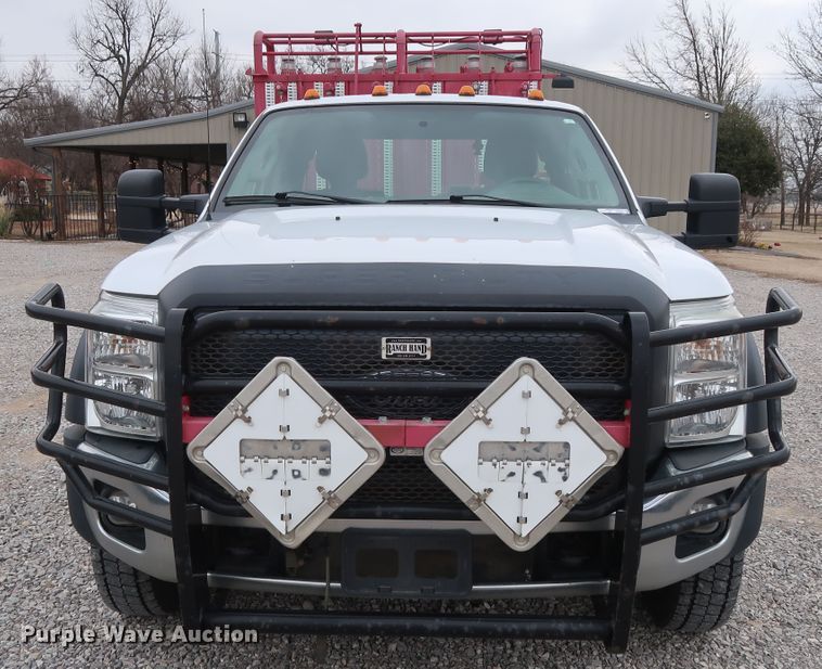 image for item GD9978 2012 Ford F550 Super Duty XL SuperCab flatbed treater truck