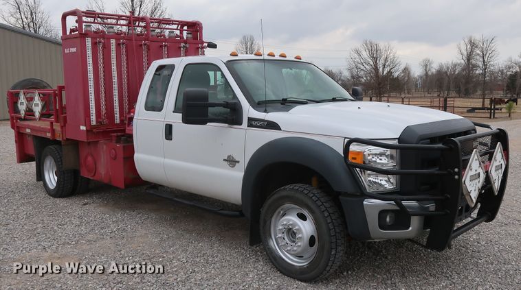 image for item GD9978 2012 Ford F550 Super Duty XL SuperCab flatbed treater truck