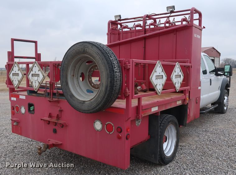 image for item GD9978 2012 Ford F550 Super Duty XL SuperCab flatbed treater truck