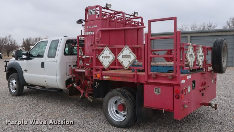 image for item GD9978 2012 Ford F550 Super Duty XL SuperCab flatbed treater truck