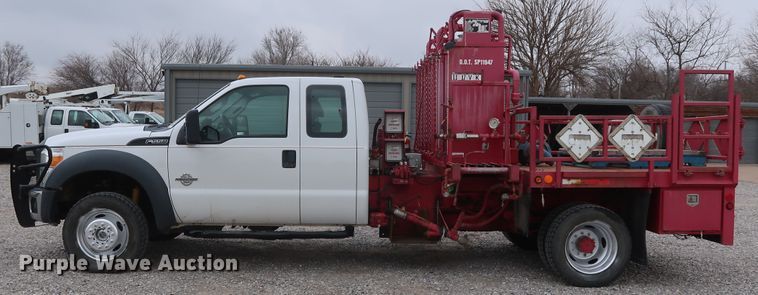 image for item GD9978 2012 Ford F550 Super Duty XL SuperCab flatbed treater truck