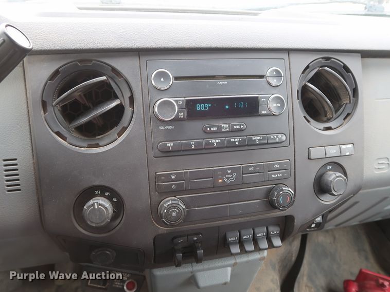 image for item GD9978 2012 Ford F550 Super Duty XL SuperCab flatbed treater truck