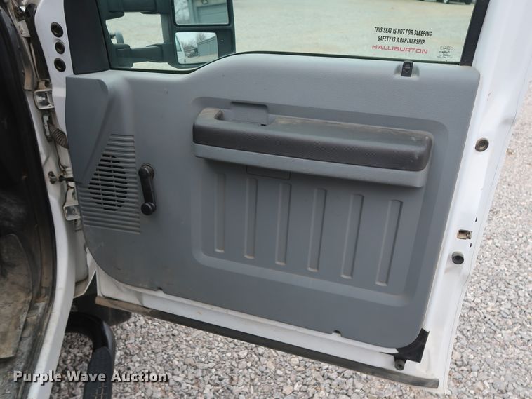 image for item GD9978 2012 Ford F550 Super Duty XL SuperCab flatbed treater truck