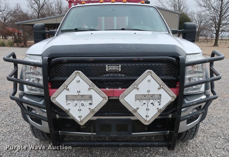 image for item GD9978 2012 Ford F550 Super Duty XL SuperCab flatbed treater truck