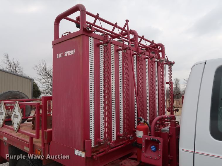 image for item GD9978 2012 Ford F550 Super Duty XL SuperCab flatbed treater truck