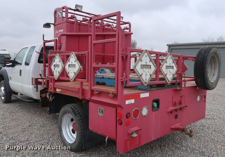 image for item GD9978 2012 Ford F550 Super Duty XL SuperCab flatbed treater truck