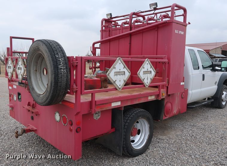 image for item GD9978 2012 Ford F550 Super Duty XL SuperCab flatbed treater truck