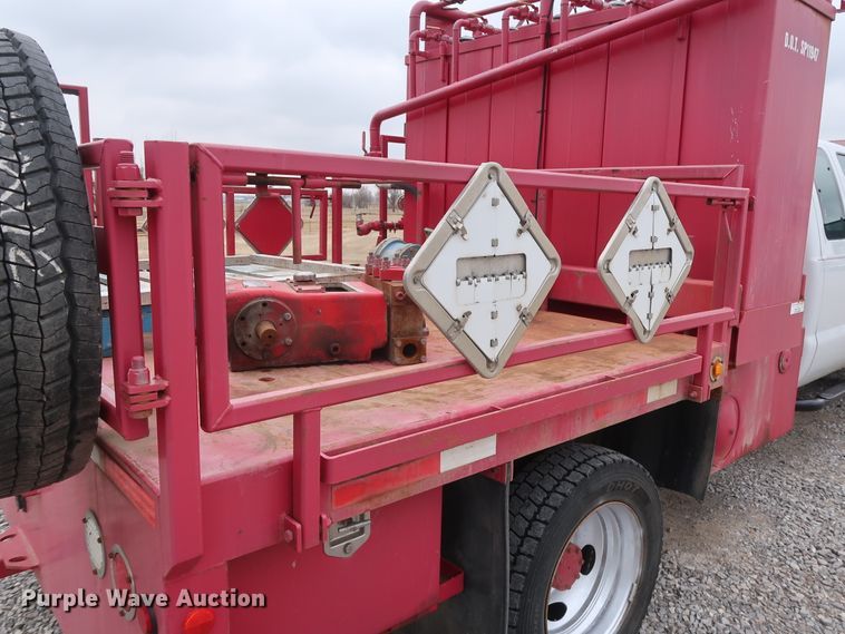 image for item GD9978 2012 Ford F550 Super Duty XL SuperCab flatbed treater truck