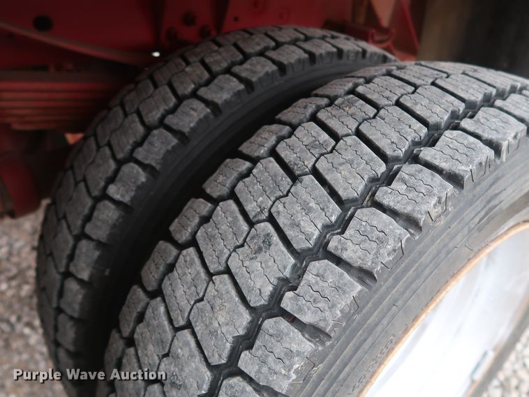 image for item GD9978 2012 Ford F550 Super Duty XL SuperCab flatbed treater truck