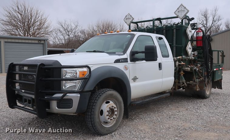 image for item GD9979 2012 Ford F550 Super Duty XL SuperCab flatbed treater truck