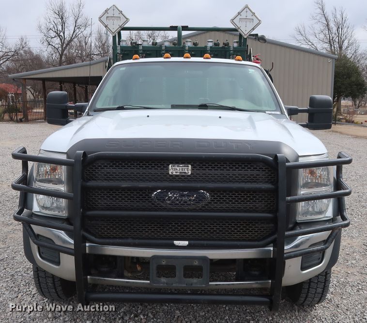 image for item GD9979 2012 Ford F550 Super Duty XL SuperCab flatbed treater truck