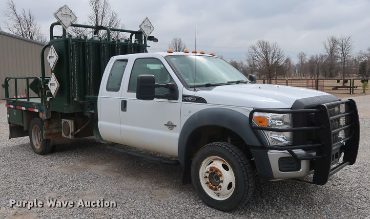 image for item GD9979 2012 Ford F550 Super Duty XL SuperCab flatbed treater truck