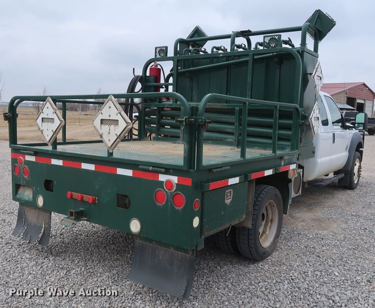 image for item GD9979 2012 Ford F550 Super Duty XL SuperCab flatbed treater truck