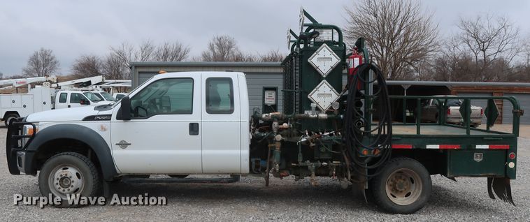 image for item GD9979 2012 Ford F550 Super Duty XL SuperCab flatbed treater truck