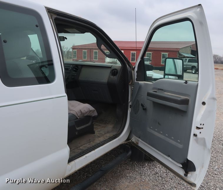 image for item GD9979 2012 Ford F550 Super Duty XL SuperCab flatbed treater truck