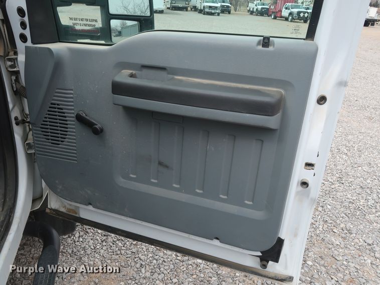 image for item GD9979 2012 Ford F550 Super Duty XL SuperCab flatbed treater truck