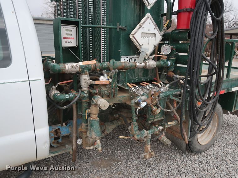 image for item GD9979 2012 Ford F550 Super Duty XL SuperCab flatbed treater truck