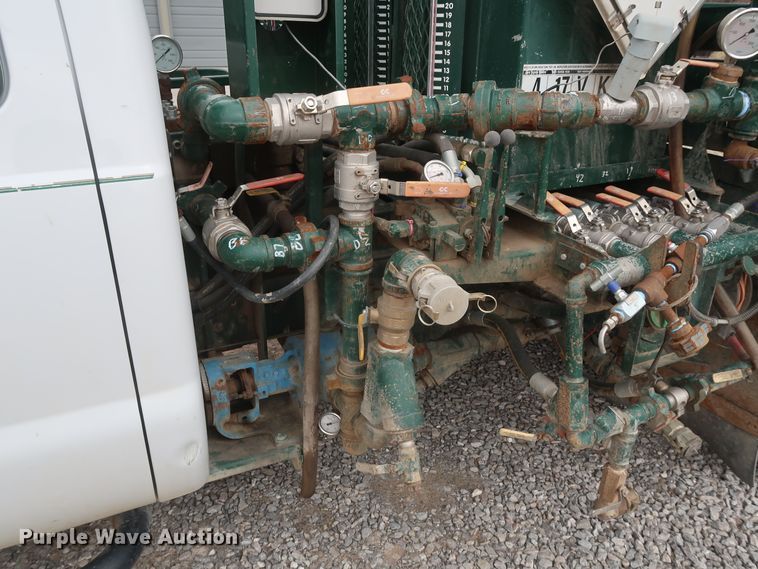 image for item GD9979 2012 Ford F550 Super Duty XL SuperCab flatbed treater truck